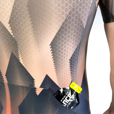 Close-up of a person wearing a textured garment with a visible brand label.