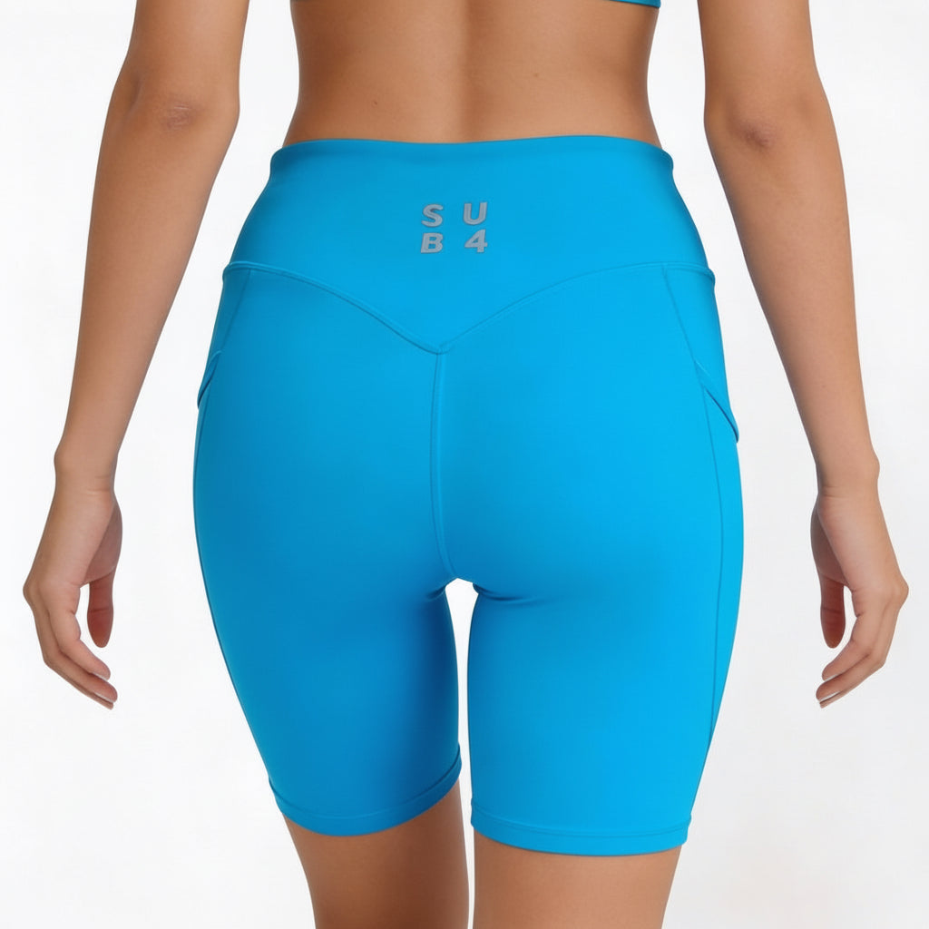 Blue athletic shorts with 'SUB 4' branding on a white background